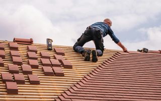 dakwerker-oranje-dakpannen-footer